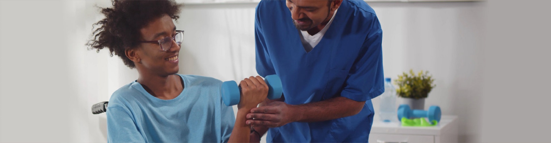 patient doing rehabilitation exercises with nurse